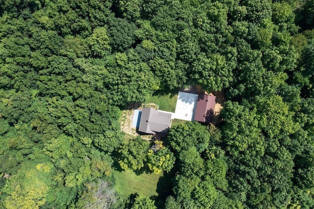 aerial view featuring a view of trees