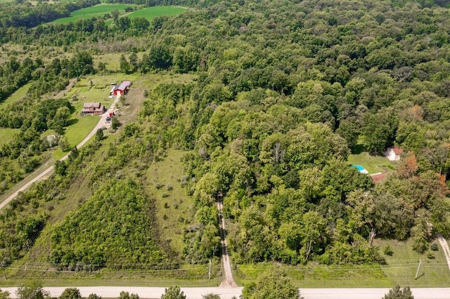 aerial view with a wooded view