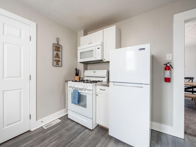 kitchen featuring baseboards, white appliances, dark wood-style flooring, and white cabinetry