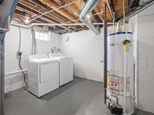 below grade area featuring gas water heater and washer and dryer