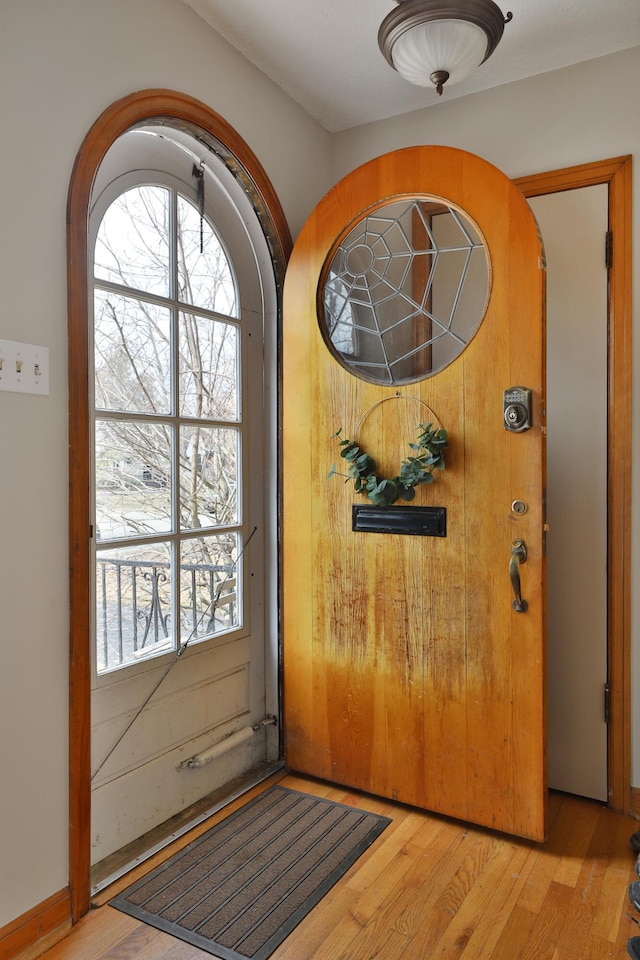 doorway featuring wood finished floors