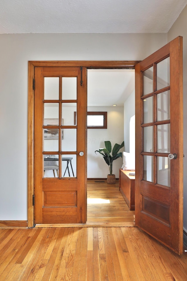 entryway featuring light wood-style flooring