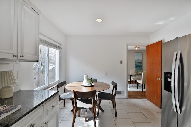 dining area featuring recessed lighting, visible vents, and light tile patterned floors