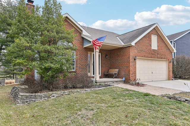 view of front of property with a front yard, concrete driveway, brick siding, and roof with shingles