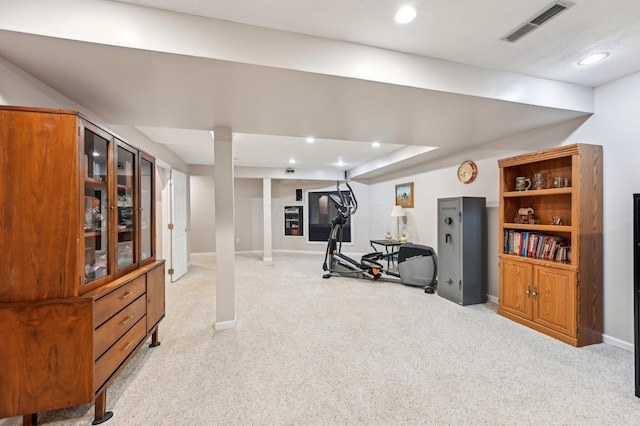 workout area featuring light carpet, baseboards, visible vents, and recessed lighting