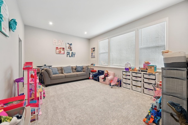 recreation room with carpet and recessed lighting