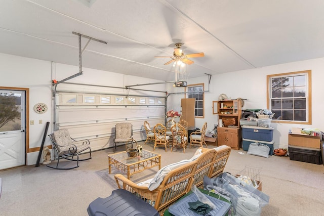 garage with a ceiling fan and a garage door opener