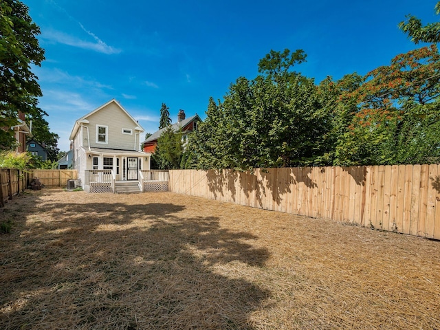 view of yard with a fenced backyard