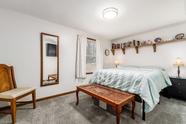 bedroom featuring baseboards and carpet flooring