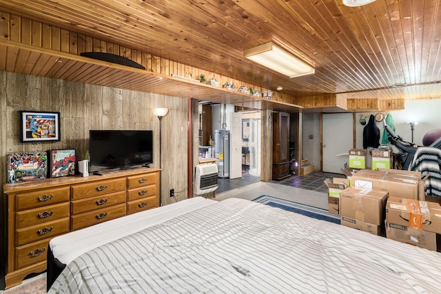 bedroom with heating unit, wood ceiling, and water heater