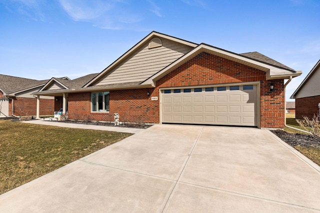 ranch-style home with a garage, concrete driveway, brick siding, and a front yard