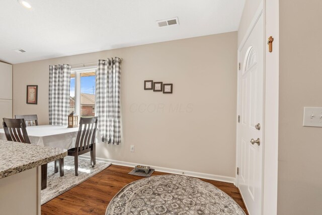 820 Timbers Edge, Marysville, OH 43040 - dining room with dark wood-style floors, baseboards, and visible vents