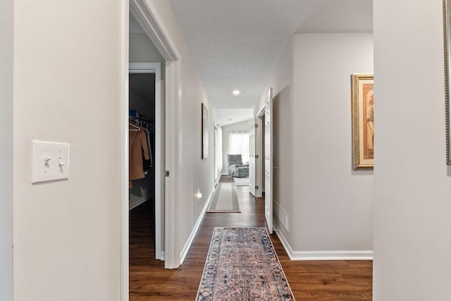 820 Timbers Edge, Marysville, OH 43040 - hall featuring dark wood finished floors, visible vents, and baseboards