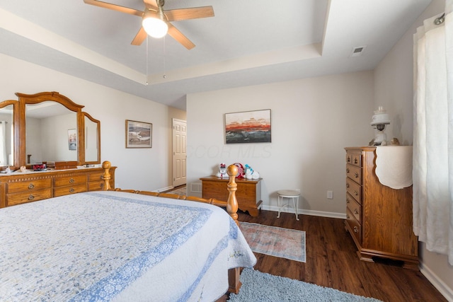 820 Timbers Edge, Marysville, OH 43040 - bedroom featuring a ceiling fan, a raised ceiling, baseboards, and wood finished floors