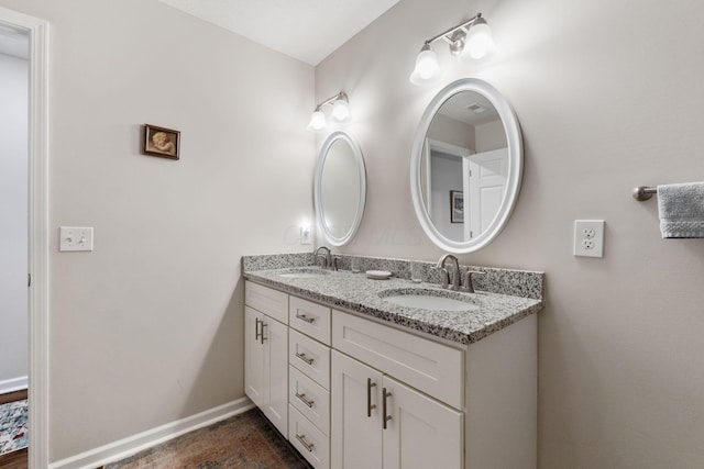 820 Timbers Edge, Marysville, OH 43040 - bathroom with a sink, baseboards, and double vanity