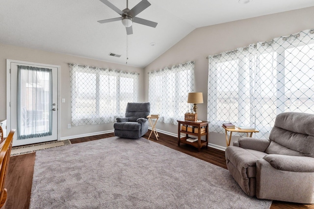820 Timbers Edge, Marysville, OH 43040 - living area featuring baseboards, visible vents, ceiling fan, dark wood-style flooring, and vaulted ceiling