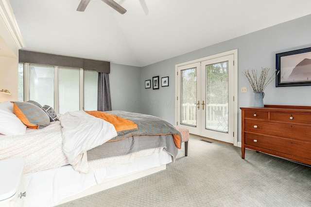 bedroom with visible vents, access to outside, french doors, carpet floors, and lofted ceiling