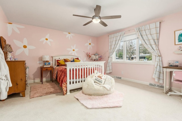 bedroom with visible vents, baseboards, carpet, and a ceiling fan