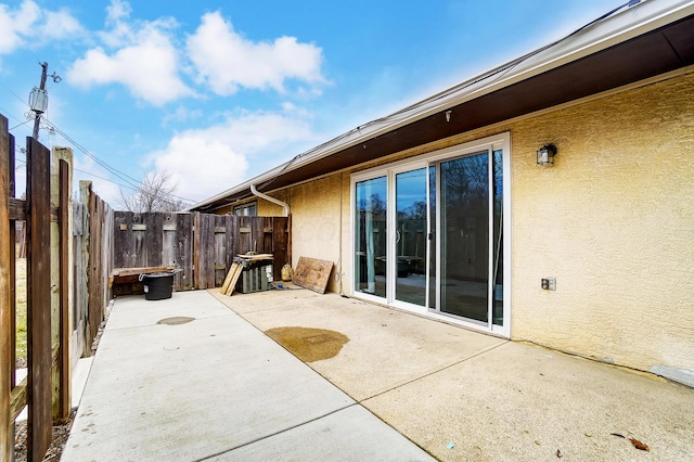 view of patio / terrace with fence