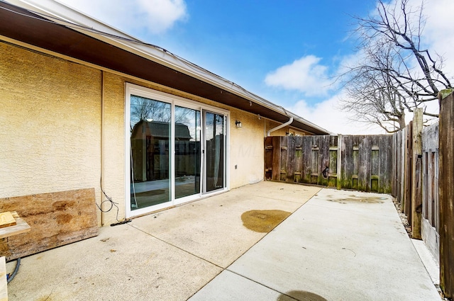 view of patio / terrace with fence