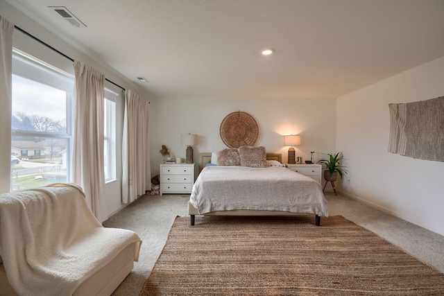 bedroom with light carpet, baseboards, visible vents, and recessed lighting