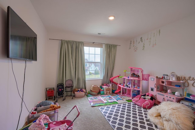 game room featuring carpet flooring and visible vents