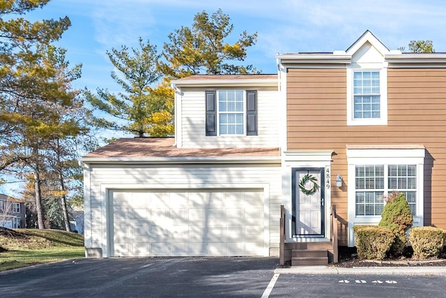 traditional-style house with driveway