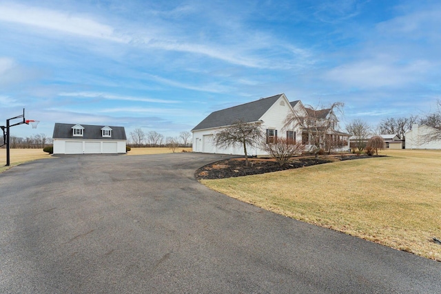 view of property exterior with a lawn