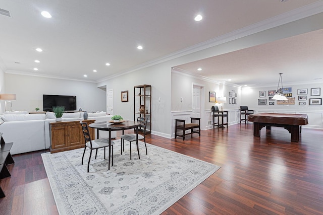 dining space with dark wood-style floors, recessed lighting, ornamental molding, and pool table