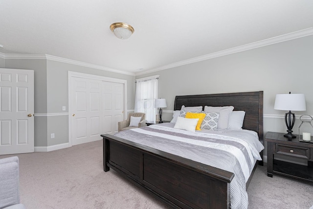 bedroom with a closet, light carpet, and crown molding