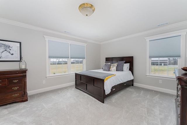 bedroom featuring carpet floors, visible vents, crown molding, and baseboards