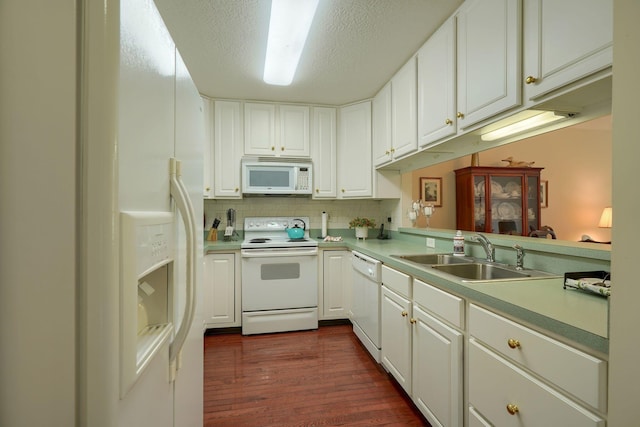 6922 Greensview Village Dr, Canal Winchester, OH 43110 - kitchen with white appliances, a sink, dark wood-style flooring, light countertops, and white cabinets