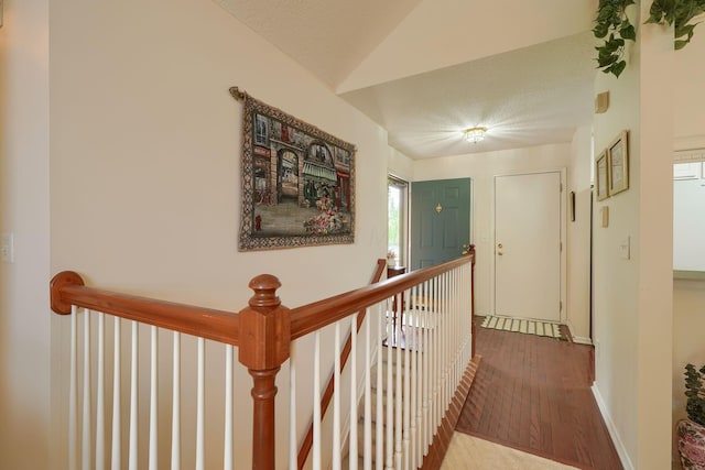 6922 Greensview Village Dr, Canal Winchester, OH 43110 - hallway with an upstairs landing, wood finished floors, baseboards, and a textured ceiling