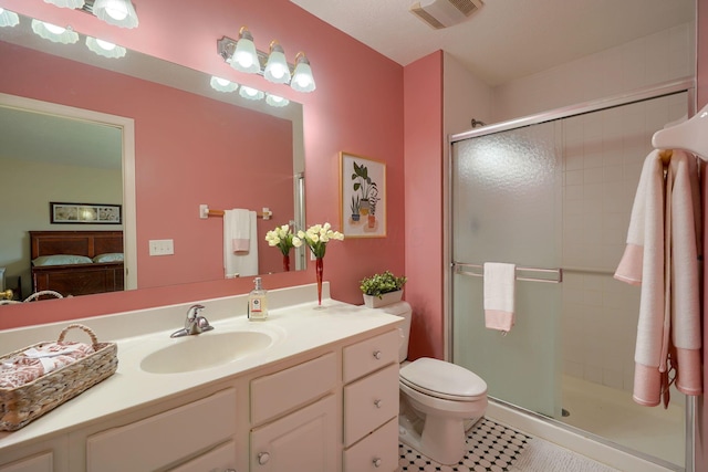 6922 Greensview Village Dr, Canal Winchester, OH 43110 - ensuite bathroom with a stall shower, vanity, toilet, and tile patterned flooring