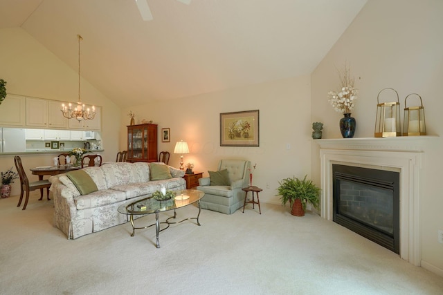 6922 Greensview Village Dr, Canal Winchester, OH 43110 - carpeted living area featuring a chandelier, high vaulted ceiling, and a glass covered fireplace