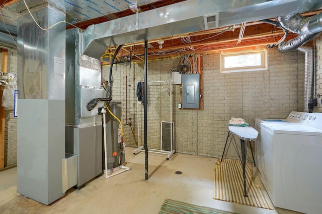 6922 Greensview Village Dr, Canal Winchester, OH 43110 - basement featuring washer and clothes dryer, electric panel, and water heater