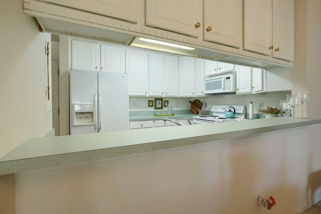 6922 Greensview Village Dr, Canal Winchester, OH 43110 - kitchen featuring white appliances, light countertops, white cabinets, and a peninsula