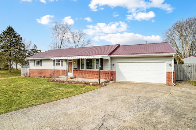 single story home with a front yard, metal roof, concrete driveway, and brick siding