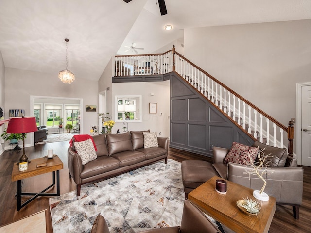 7969 Linksview Cir, Westerville, OH 43082 - living area with a ceiling fan, wood finished floors, high vaulted ceiling, and stairs