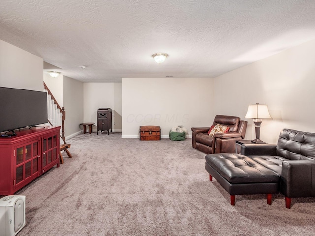 7969 Linksview Cir, Westerville, OH 43082 - living area featuring carpet floors, stairway, and a textured ceiling
