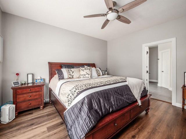 7969 Linksview Cir, Westerville, OH 43082 - bedroom with wood finished floors and ceiling fan