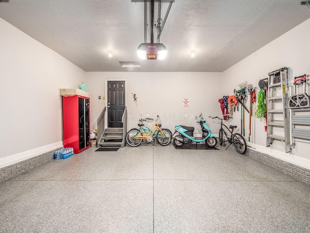 7969 Linksview Cir, Westerville, OH 43082 - garage featuring a garage door opener