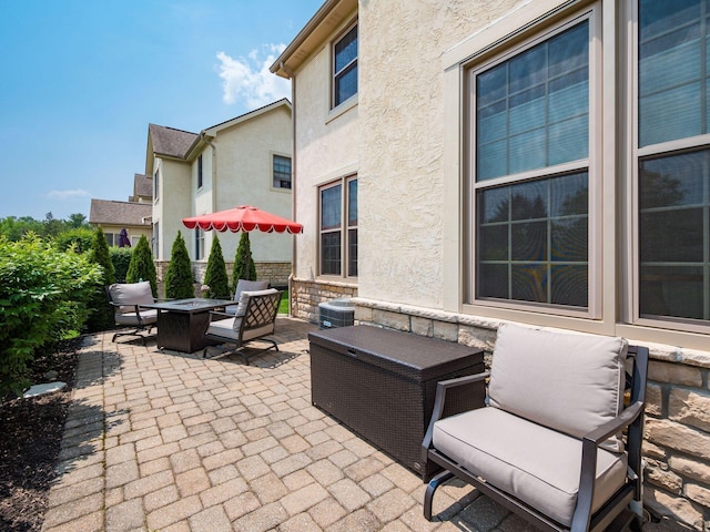 7969 Linksview Cir, Westerville, OH 43082 - view of patio with a fire pit