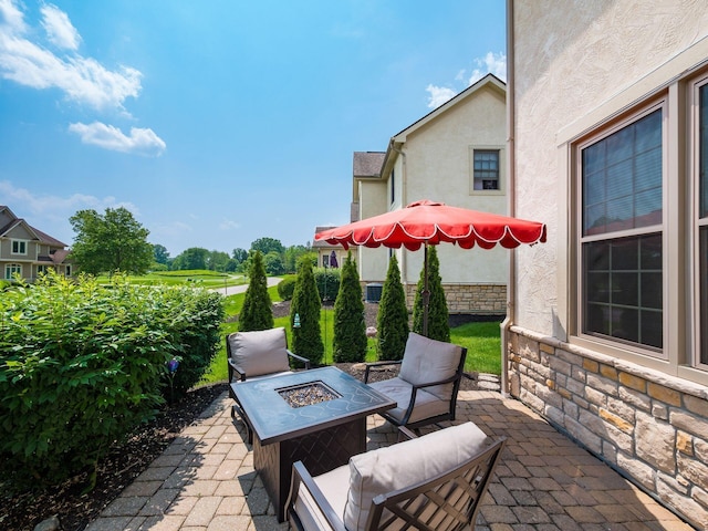 7969 Linksview Cir, Westerville, OH 43082 - view of patio featuring an outdoor fire pit