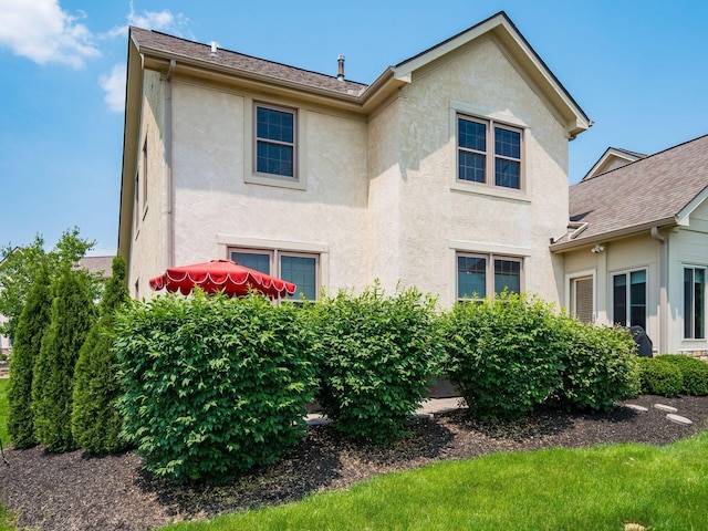 7969 Linksview Cir, Westerville, OH 43082 - view of home's exterior featuring stucco siding