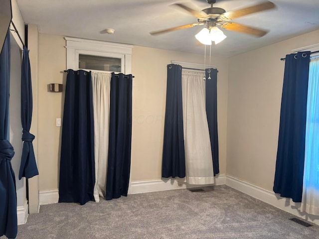 324 E Main St, Cardington, OH 43315 - empty room featuring carpet floors and a ceiling fan