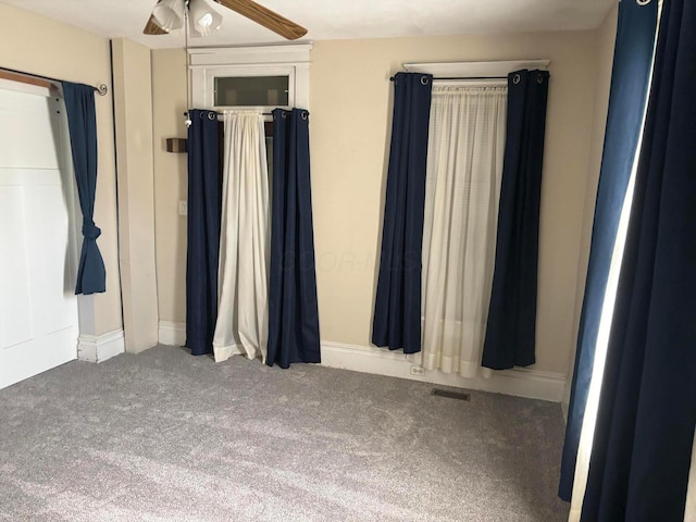 324 E Main St, Cardington, OH 43315 - carpeted empty room featuring ceiling fan