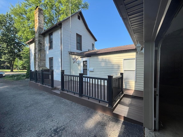 324 E Main St, Cardington, OH 43315 - back of house with a chimney