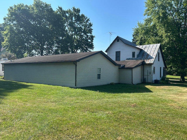 324 E Main St, Cardington, OH 43315 - view of home's exterior featuring a lawn