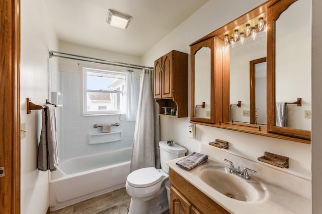 full bath featuring visible vents, shower / bath combo with shower curtain, vanity, and toilet